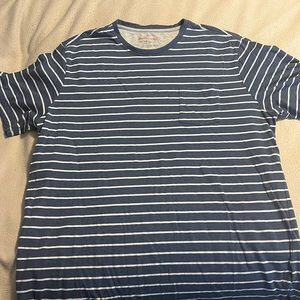 Blue with white stripes T-shirt with chest pocket.